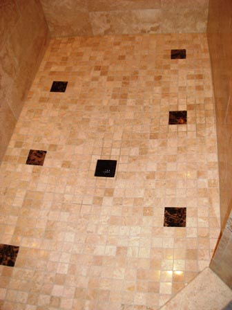 stone mosaic shower floor tile with accent