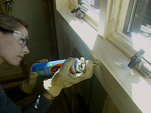 insulate around windows with spray foam